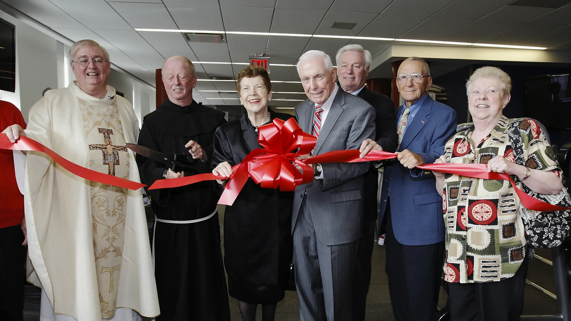 Ribbon-cutting ceremony with school and community leaders at St. Francis Preparatory School